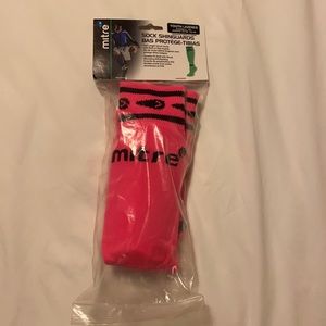 Brand new mitre shinguard socks.